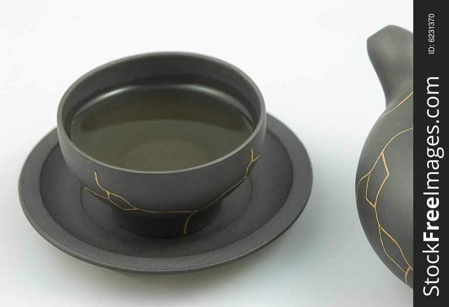 Make Chinese tea with ZiSha earthenware.