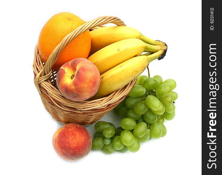 Orange and a ripe beautiful fruit on a white 
background