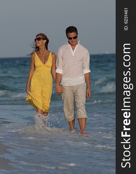 Couple In Surf In Beach