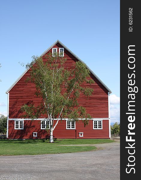 Large Red Barn with Blue Sky
