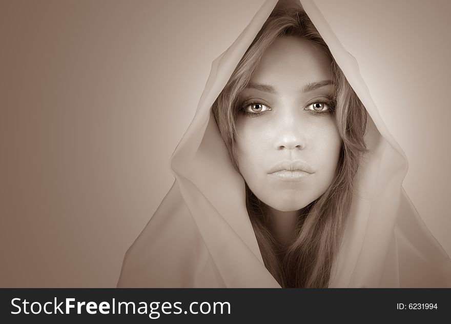 Beautiful Blond woman with white cape isolated. Beautiful Blond woman with white cape isolated