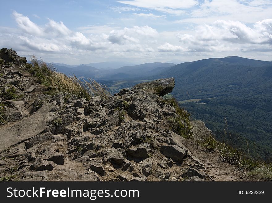 Open view from the edge of the mountain precipice. Open view from the edge of the mountain precipice