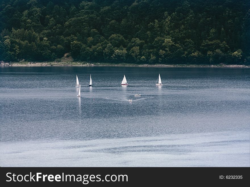 Boat-race at the Roznowskie lake in Poland. Boat-race at the Roznowskie lake in Poland