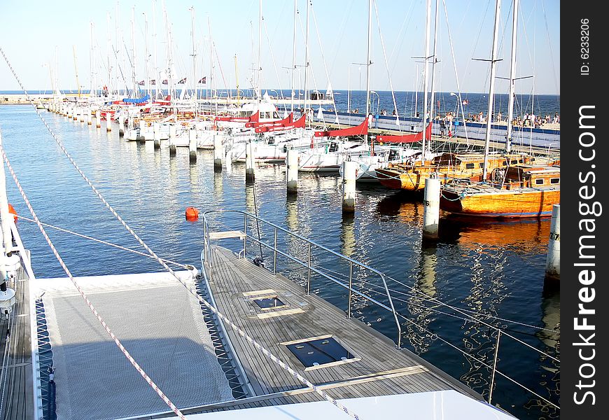 The catamaran deck detail. Yacht port.