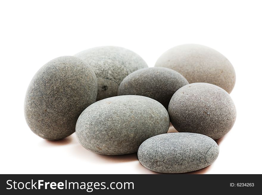 Pebble stones on white background. Pebble stones on white background