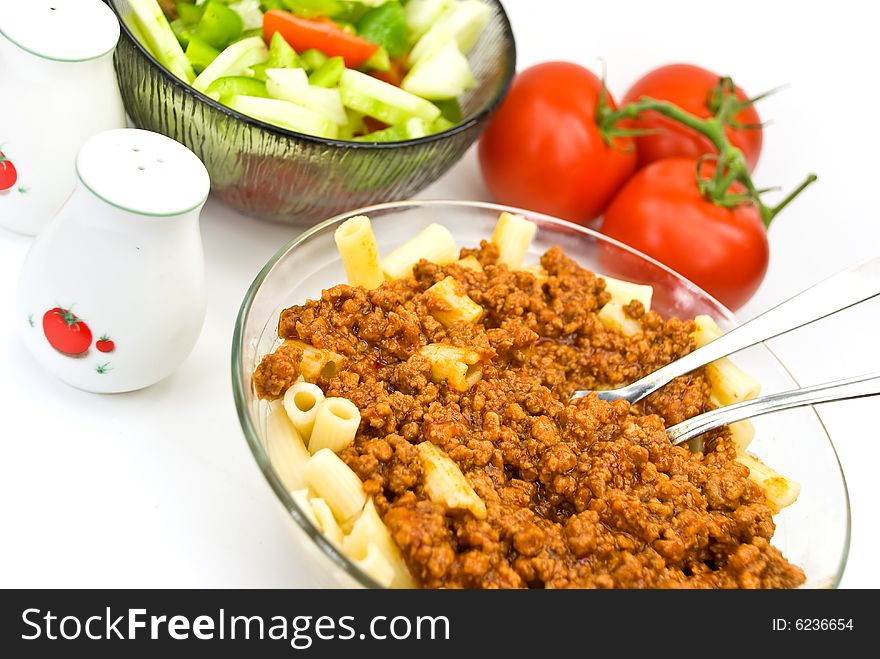 Macaroni ,sauce bolognese with salad.