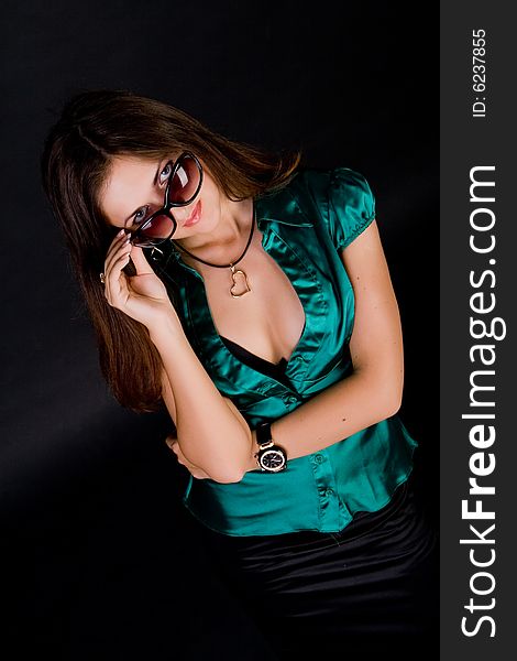 Lady On Green Blouse Wirh Sunglasses