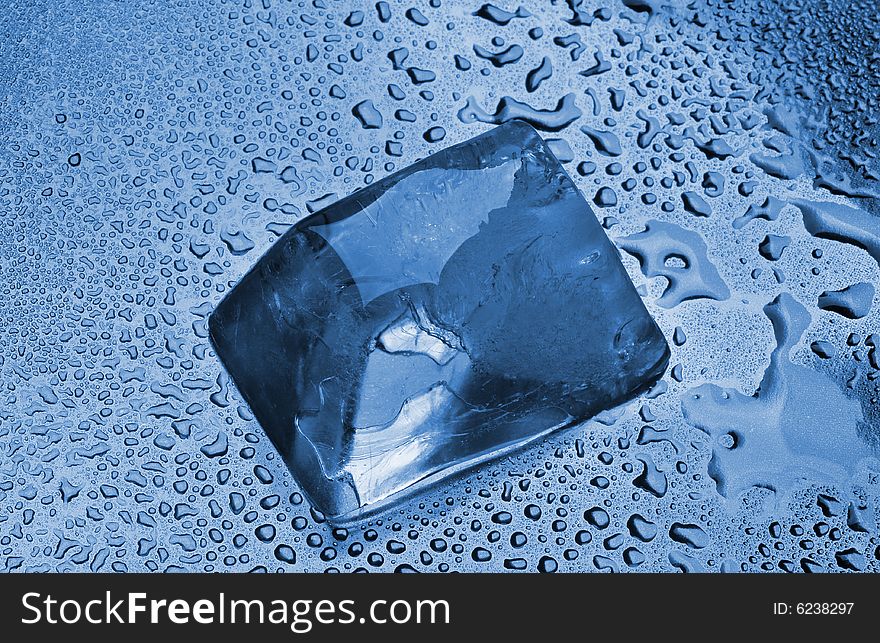 The melting ice cubes with drops