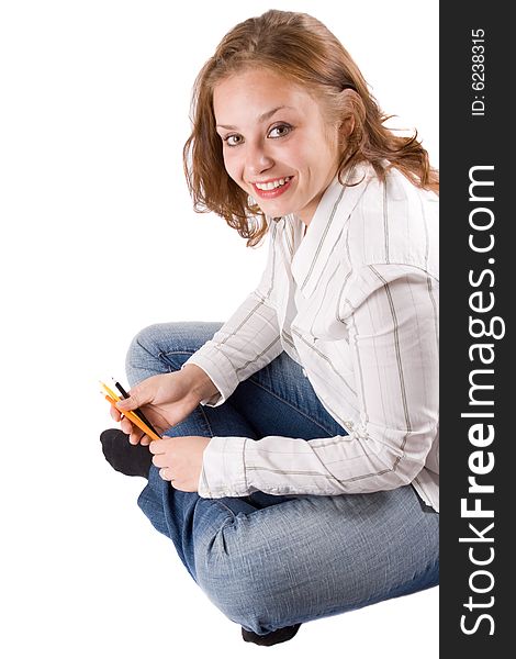 Beautiful girl sitting with crayons in her hands. Isolated on white. #8. Beautiful girl sitting with crayons in her hands. Isolated on white. #8