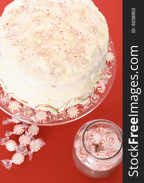 Beautiful bakery peppermint cake isolated on red