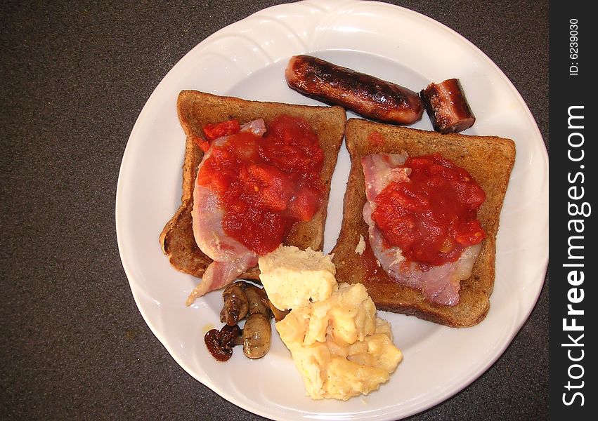 Cooked breakfast on two slices of wholemeal bread