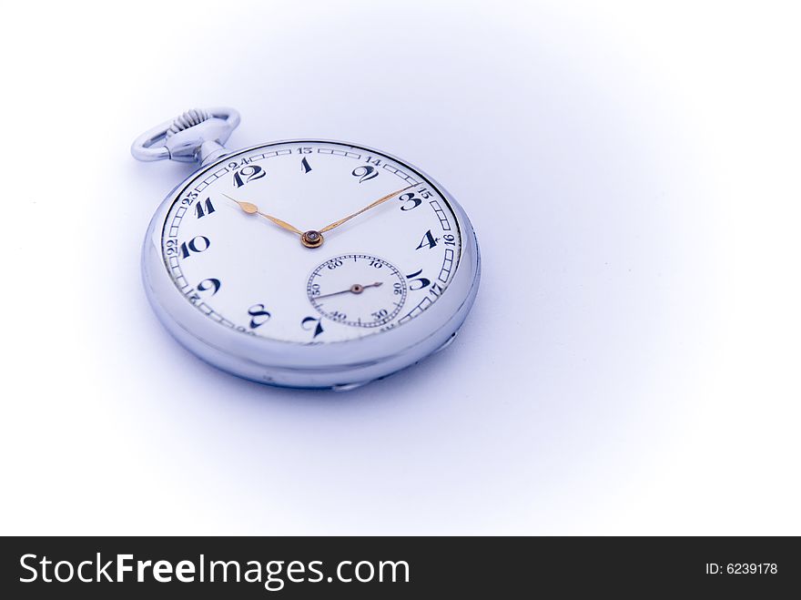 Antique silver watch with gold hands, white face with black numerals. Separate minute face. Antique silver watch with gold hands, white face with black numerals. Separate minute face.