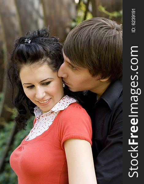 Outdoor portrait of young loving couple