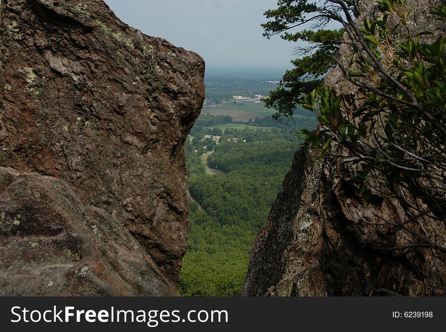 View through the crack in a mountain top rock. Located in North Carolina. View through the crack in a mountain top rock. Located in North Carolina