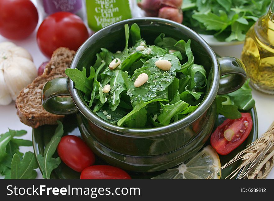 Rucola with pine corns