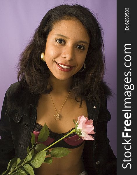 Portrait of a young attractive woman with flowers