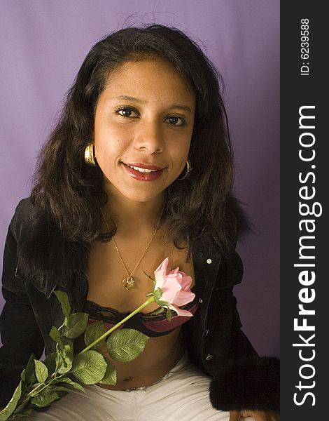 Portrait of a young attractive woman with flowers