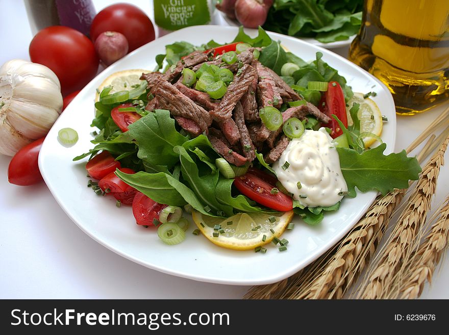 Frech salad with rucola and beafsteck. Frech salad with rucola and beafsteck