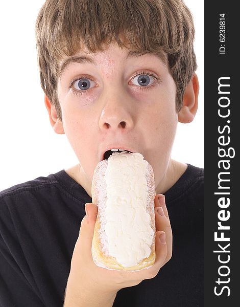 Kid eating a donut isolated on white