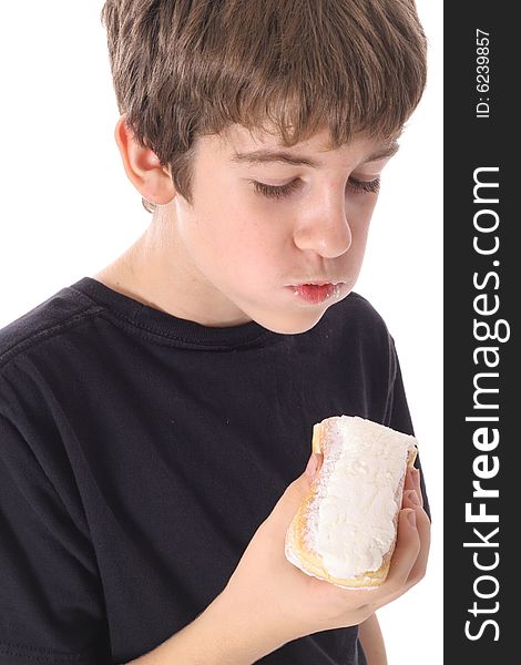 Boy looking at donut isolated on white
