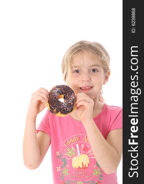 Child Holding A Chocolate Donut Vertical