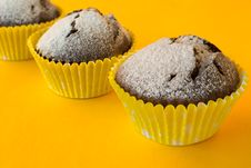 Muffins On Yellow Background Royalty Free Stock Photos Muffins On Yellow Background Royalty Free Stock Photos