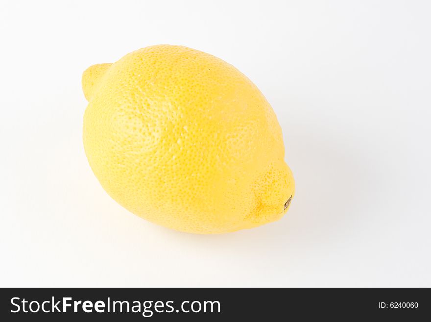 A lemon against a white background. A lemon against a white background