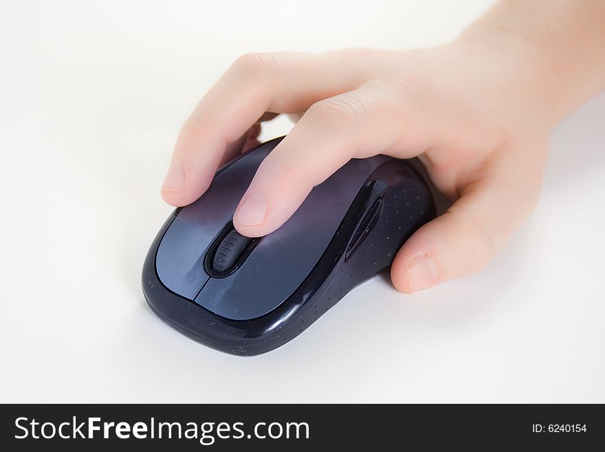 Hand with a computer mouse against a white background. Hand with a computer mouse against a white background