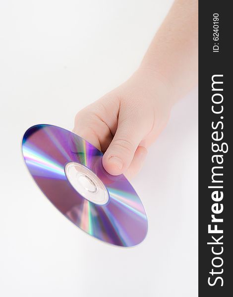 A hand holding a dvd against an isolated white background