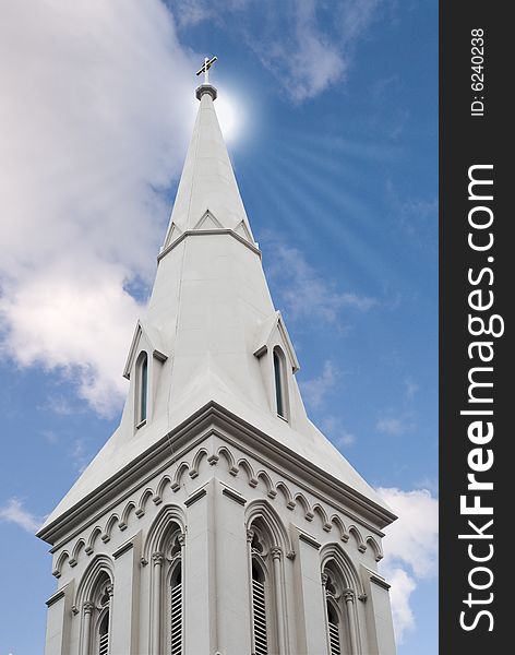 Sunlight streaming at a church Steeple