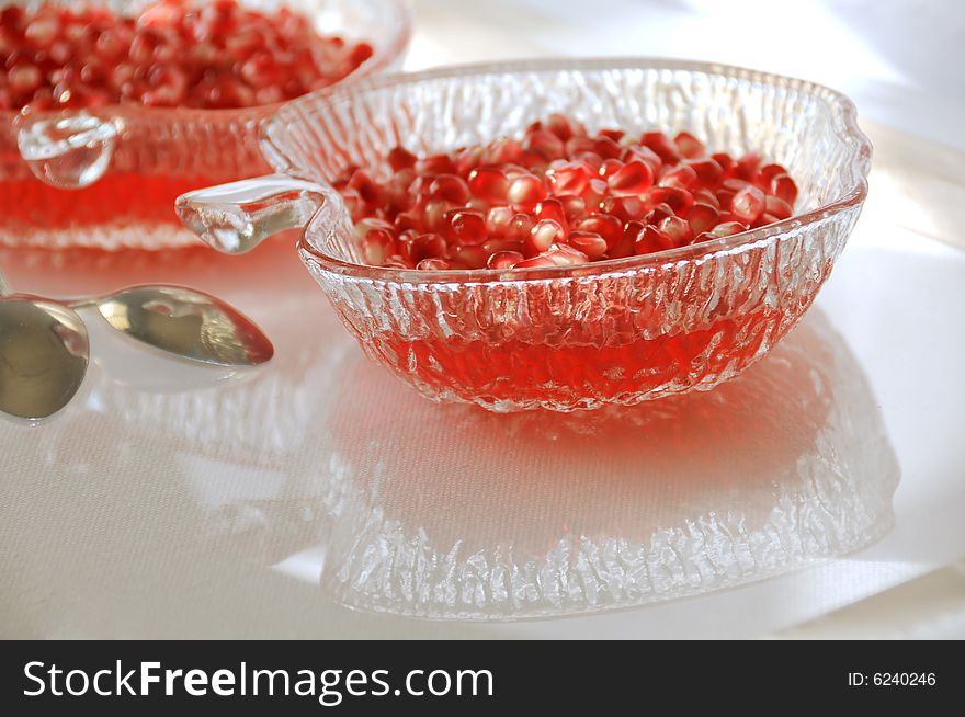 Close-up of dessert with pomegranate and red jelly