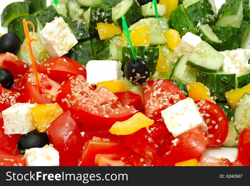 Sliced cucumbers paprika and tomatoes in salad