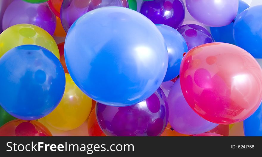 Many multicolored balloons suitable for background. Many multicolored balloons suitable for background