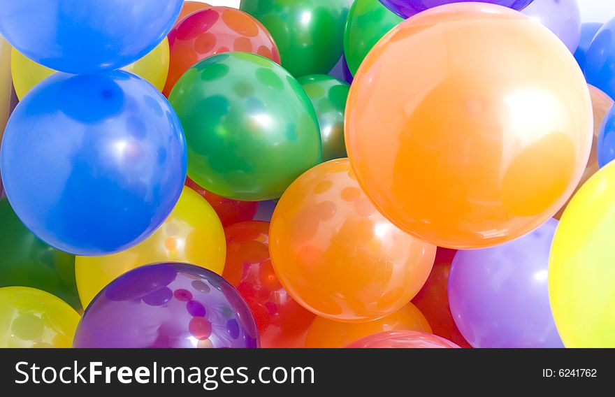 Many multicolored balloons suitable for background. Many multicolored balloons suitable for background