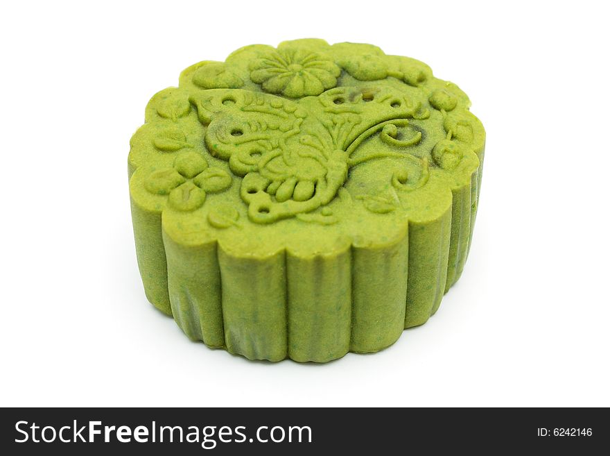 A green tea moon cake isolated on white background.