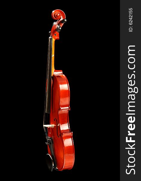 Violin, isolated on black background. Violin, isolated on black background