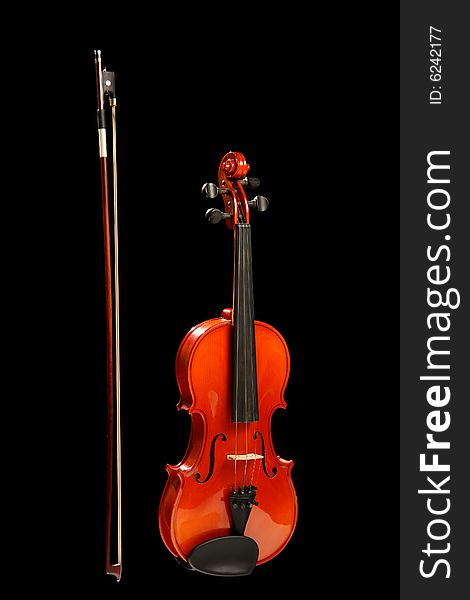 Violin and bow, isolated on black. Violin and bow, isolated on black