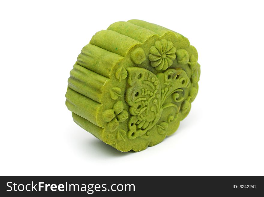 A green tea moon cake standing on white background.