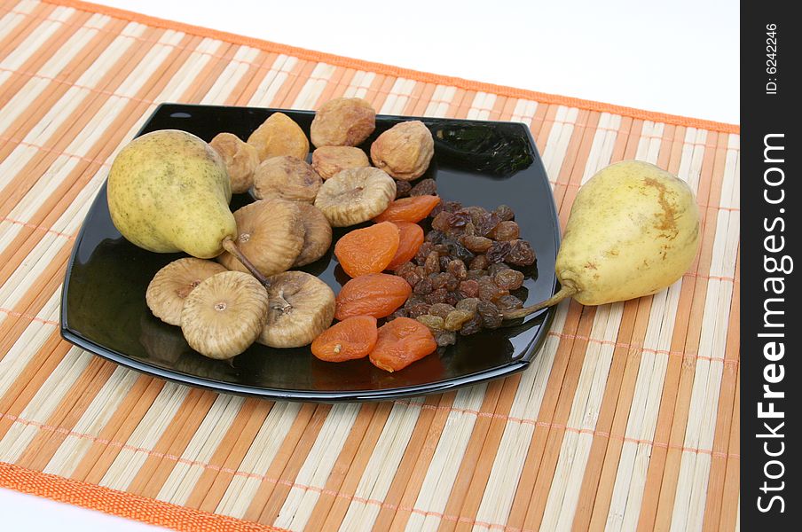 Fruit and  pears on a plate