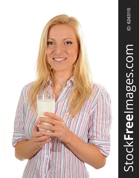 Young woman drinking a glas of milk. Isolated on white background. Young woman drinking a glas of milk. Isolated on white background.