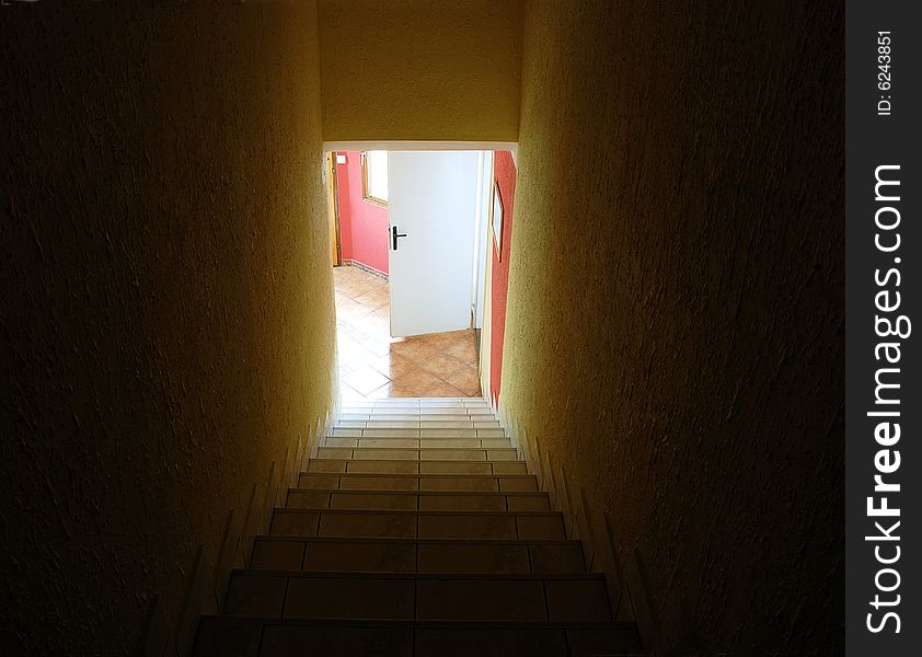 Light on end of dark stairs. Light on end of dark stairs