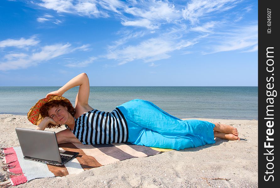 Woman With Laptop At Seaside