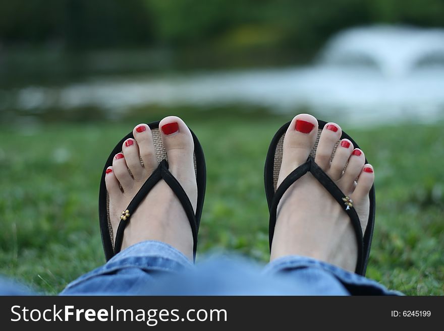 Beautiful red toe-nails, pedicure, woman feet. Beautiful red toe-nails, pedicure, woman feet