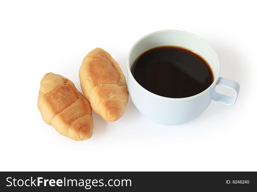 Two fresh croissants and cup of black coffee on white background. Two fresh croissants and cup of black coffee on white background