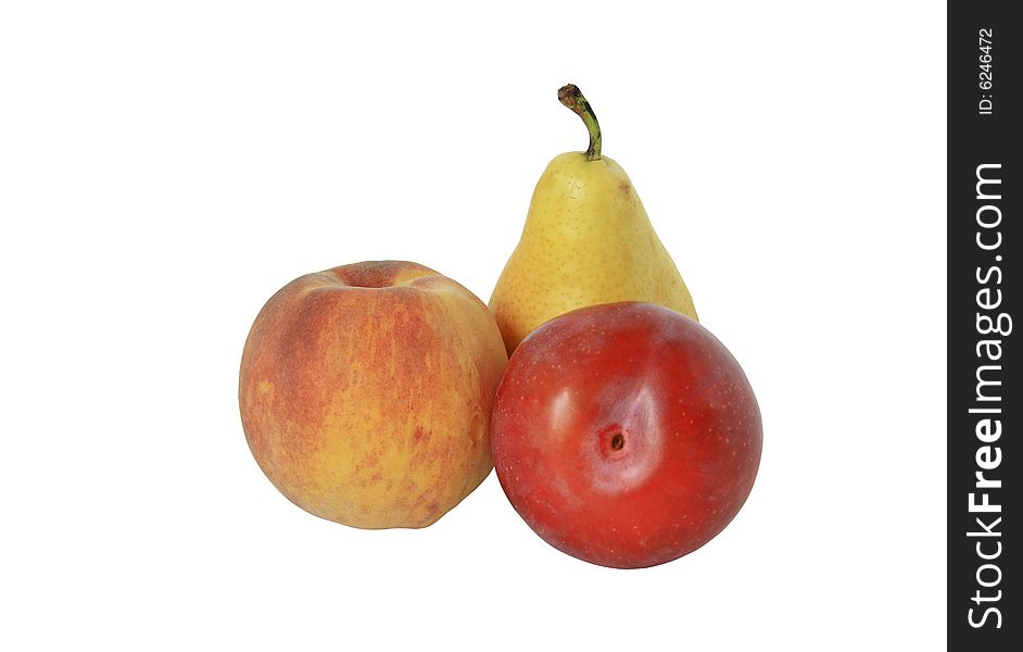 Fresh pear, peach and plum lying on white background. Fresh pear, peach and plum lying on white background