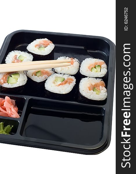 Rolls of sushi on a plate with chopsticks. Rolls of sushi on a plate with chopsticks.
