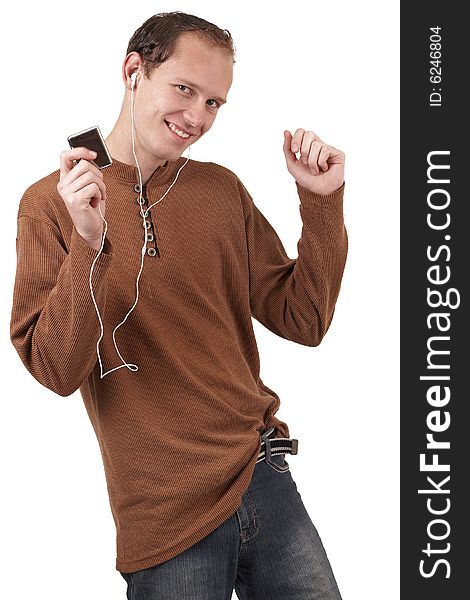 Young caucasian man wearing trendy clothes listening to music. Isolated on white background. Young caucasian man wearing trendy clothes listening to music. Isolated on white background