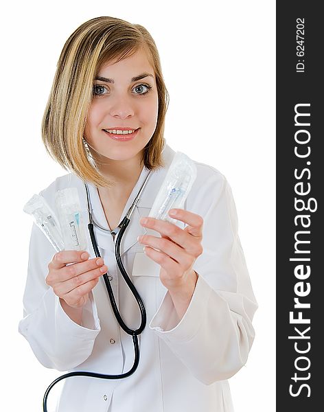 Young nurse with non-permanent syringes on white