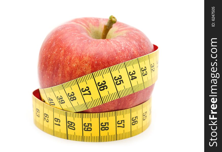 Red apple in measuring tape