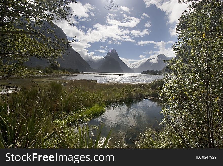 It shows the famous Milford Sound a Fjord on the South Island of New Zealand.